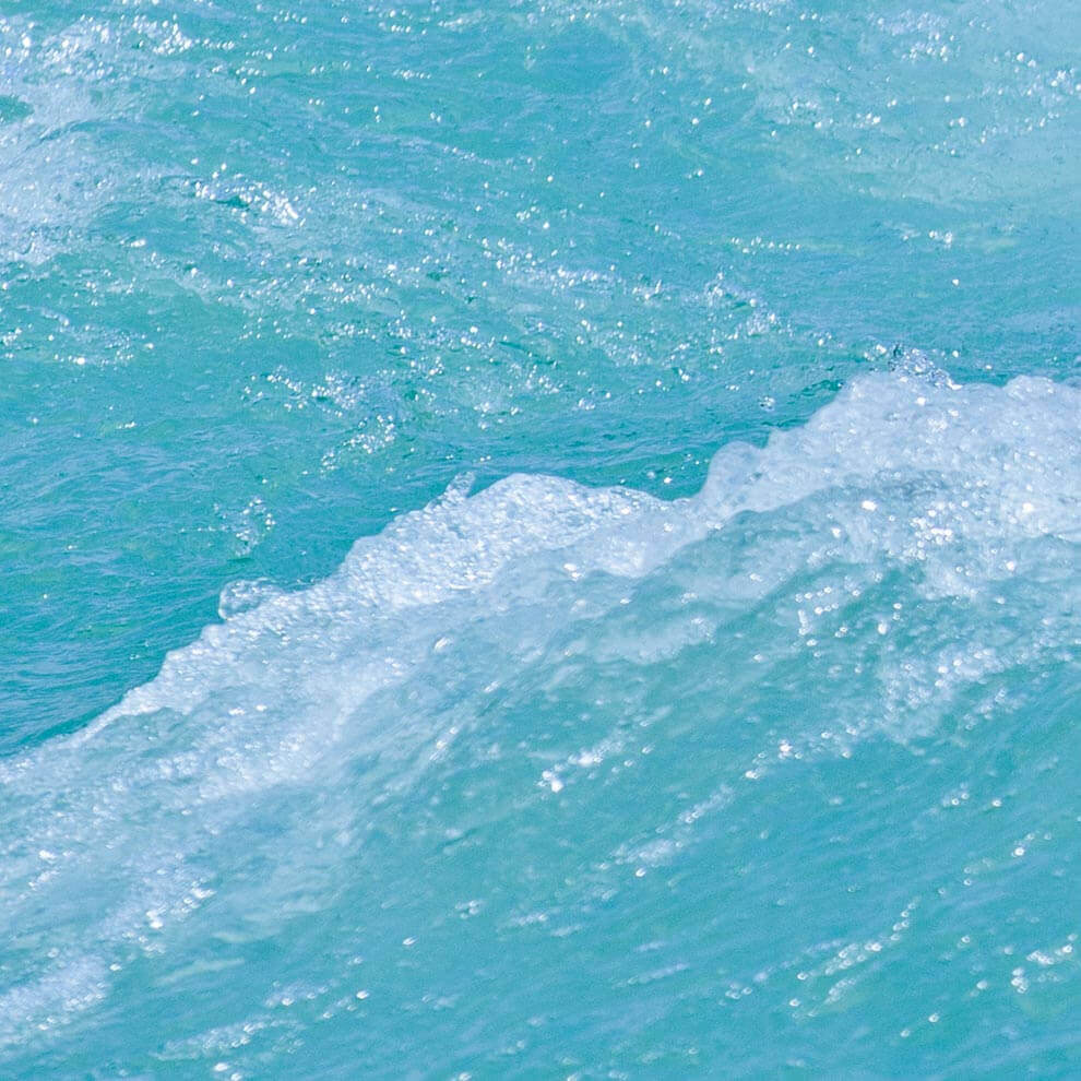 A close-up of a turbulent water surface.